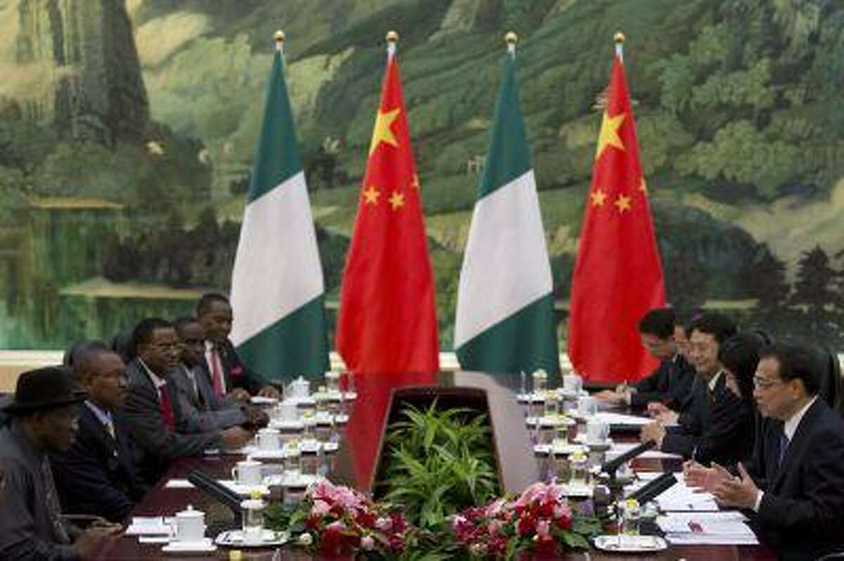 Chinese Premier Li Keqiang talks during his meeting with Nigerian President Goodluck Jonathan at the Great Hall of the People on July 11, 2013 in Beijing, China.