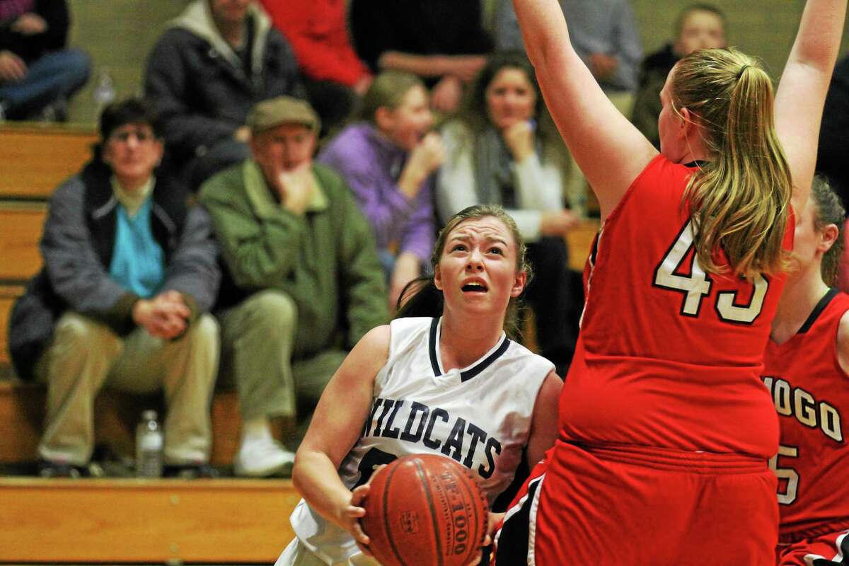 Wolcott Tech’s Ashley Desrosiers goes up for a layup in the Wildcats 47-29 loss to Wamogo.