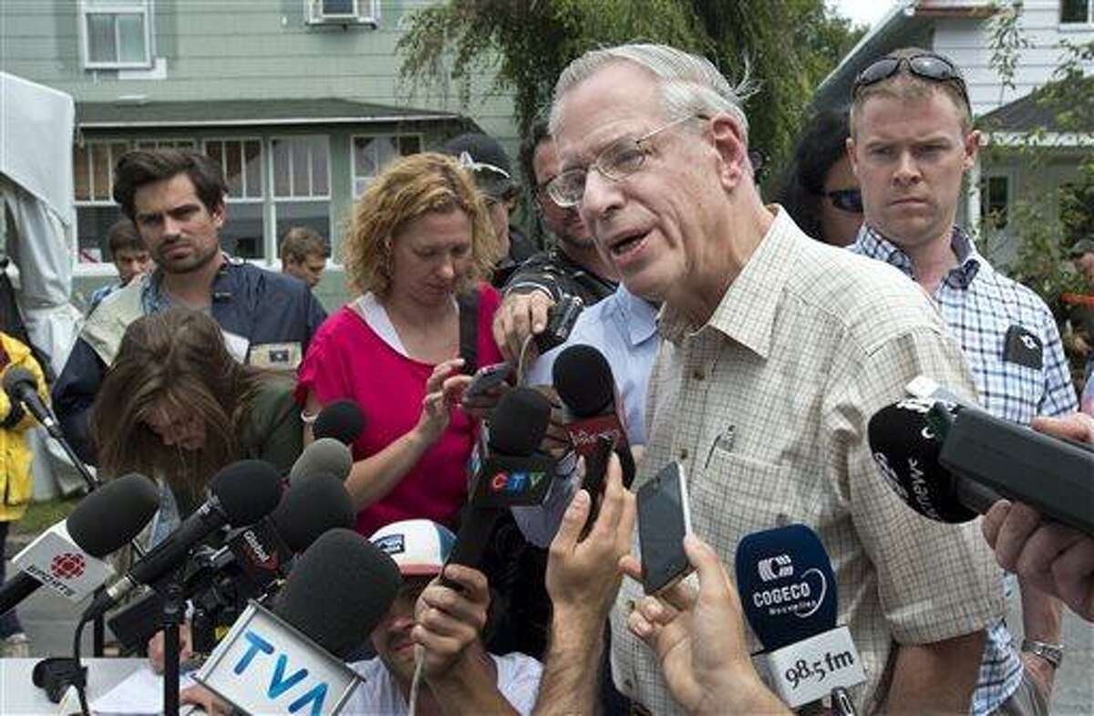 Rail World Inc. president Edward Burkhardt speaks to the media as he tours Lac-Megantic, Quebec, on Wednesday, July 10, 2013. A Rail World train crashed into the town killing at least 15 people. Burkhardt blamed the accident on an employee who he said had failed to properly set the brakes. (AP Photo/The Canadian Press, Paul Chiasson)