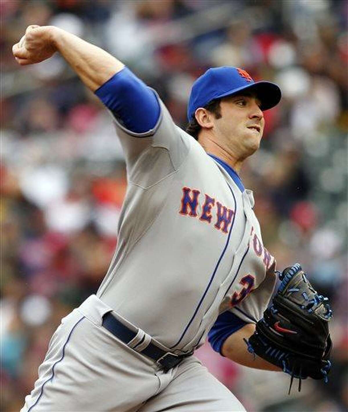 New York Mets starting pitcher Matt Harvey throws against the Minnesota Twins during the first inning of a baseball game Saturday, April 13, 2013, in Minneapolis. Harvey had the win and the Mets defeated the Twins 4-2. (AP Photo/Genevieve Ross)