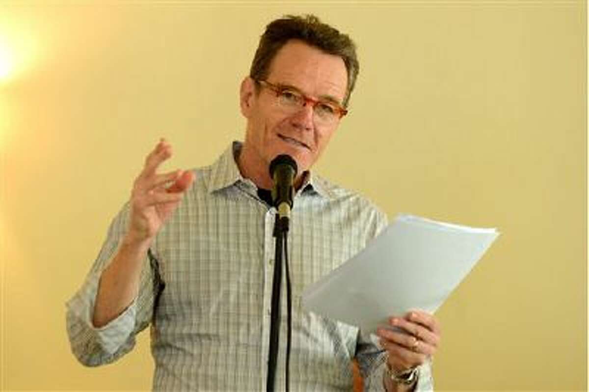 Bryan Cranston reads from "The Magiker," by Charles Dennis, in The Caribou Room at Sportsmen's Lodge on Tuesday, Oct. 22, 2013, in Studio City, Calif.