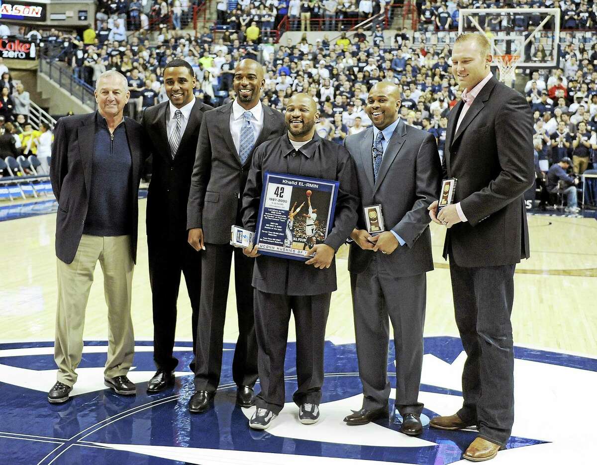 Members of Connecticut’s 1999 national championship team gather before a game between Connecticut and SMU in Storrs, Conn., in February. From left former coach Jim Calhoun, Kevin Freeman, Richard “Rip” Hamilton, Khalid El-Amin, Rickey Moore and Jake Voskuhl.