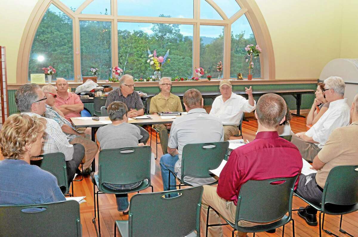 New Hartford sewer users questioned the WPCA on their elevated user rates before migrating downstairs to a board of selectman meeting on Tuesday, Aug. 27, 2013.