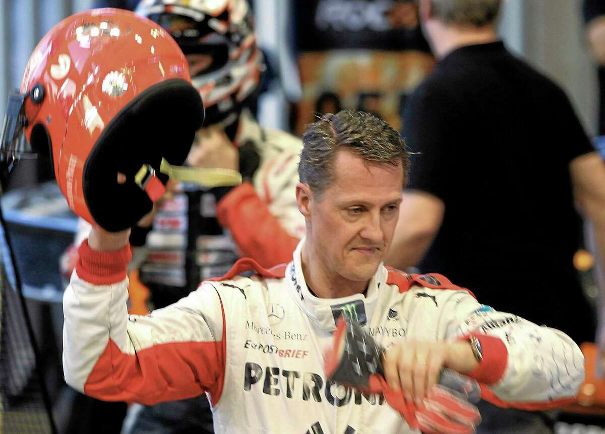 Michael Schumacher, here after a test drive prior to the Race Of Champions in Bangkok, Thailand, has had two surgeries since suffering a life-threatening head injury in a ski accident Sunday in Meribel, France.