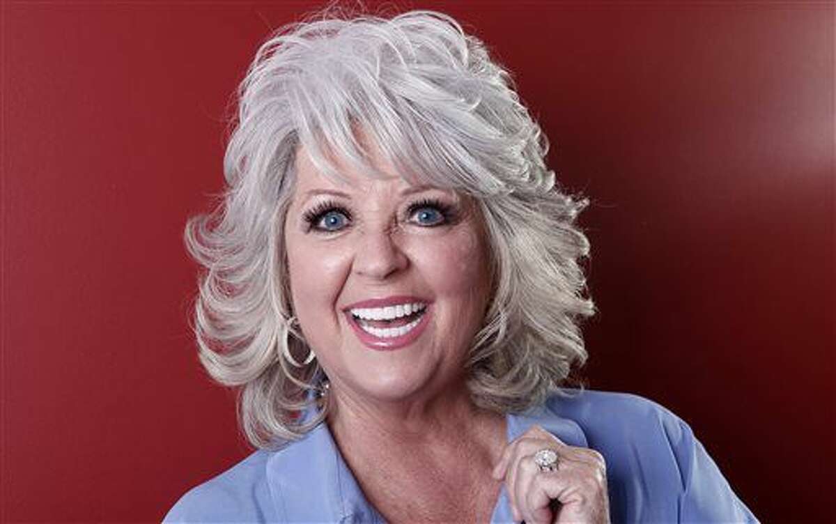 FILE - In this Jan. 17, 2012 file photo, celebrity chef Paula Deen poses for a portrait in New York. A federal judge in Georgia on Monday, Aug. 12, 2013 threw out race discrimination claims by a former Savannah restaurant manager whose lawsuit against Deen ended up causing the celebrity cook to lose a big slice of her culinary empire. (AP Photo/Carlo Allegri, File) (Carlo Allegri)