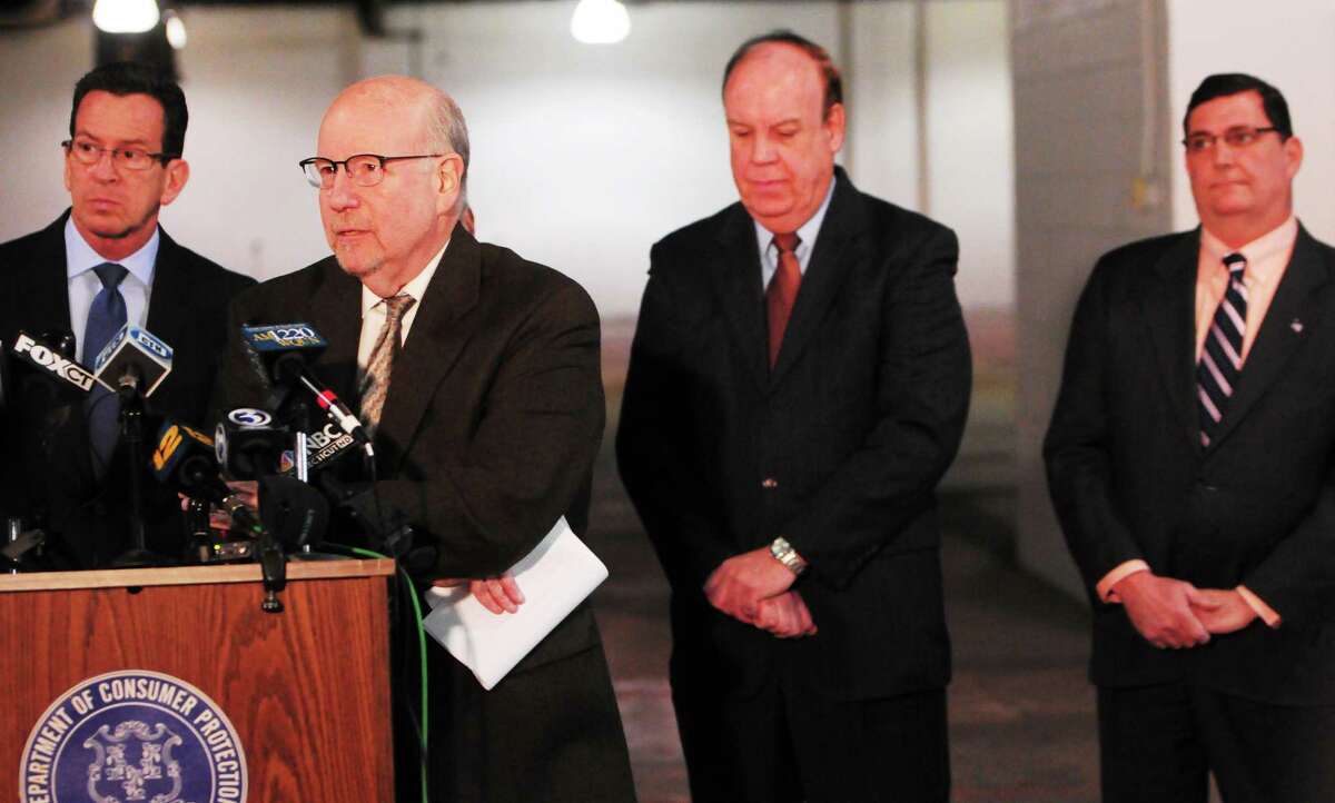 Department of Consumer Protection Commissioner William M. Rubenstein, second from left, Gov. Dannel P. Malloy, left, state Rep. Steve Dargan, third from left, and West Haven Mayor Edward M. O’Brien.