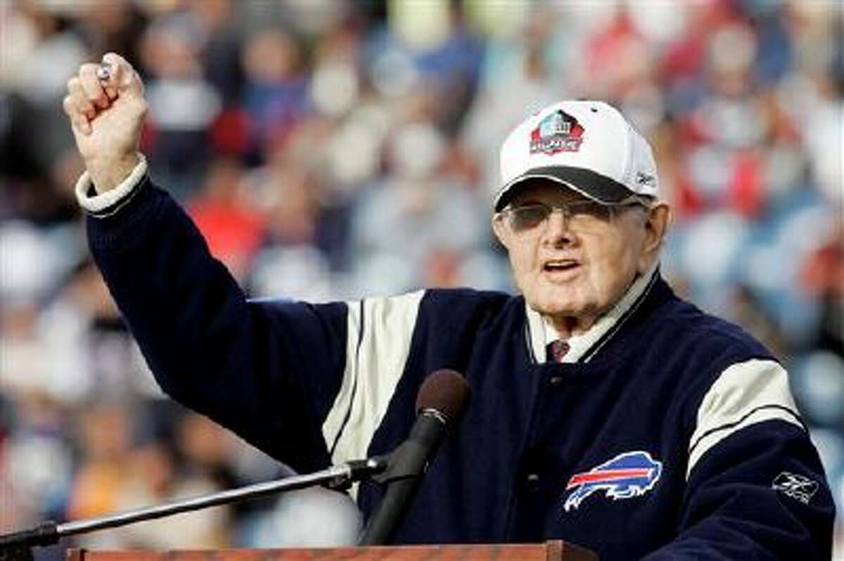 FILE - In this Nov. 1, 2009, file photo, Buffalo Bills' owner Ralph Wilson Jr. holds up his Hall of Fame ring during a halftime NFL football ceremony against the Houston Texans in Orchard Park, N.Y. Bills owner Wilson Jr. has died at the age of 95. NFL.com says team president Russ Brandon announced his death at the league's annual meeting. (AP Photo/Dean Duprey, File)