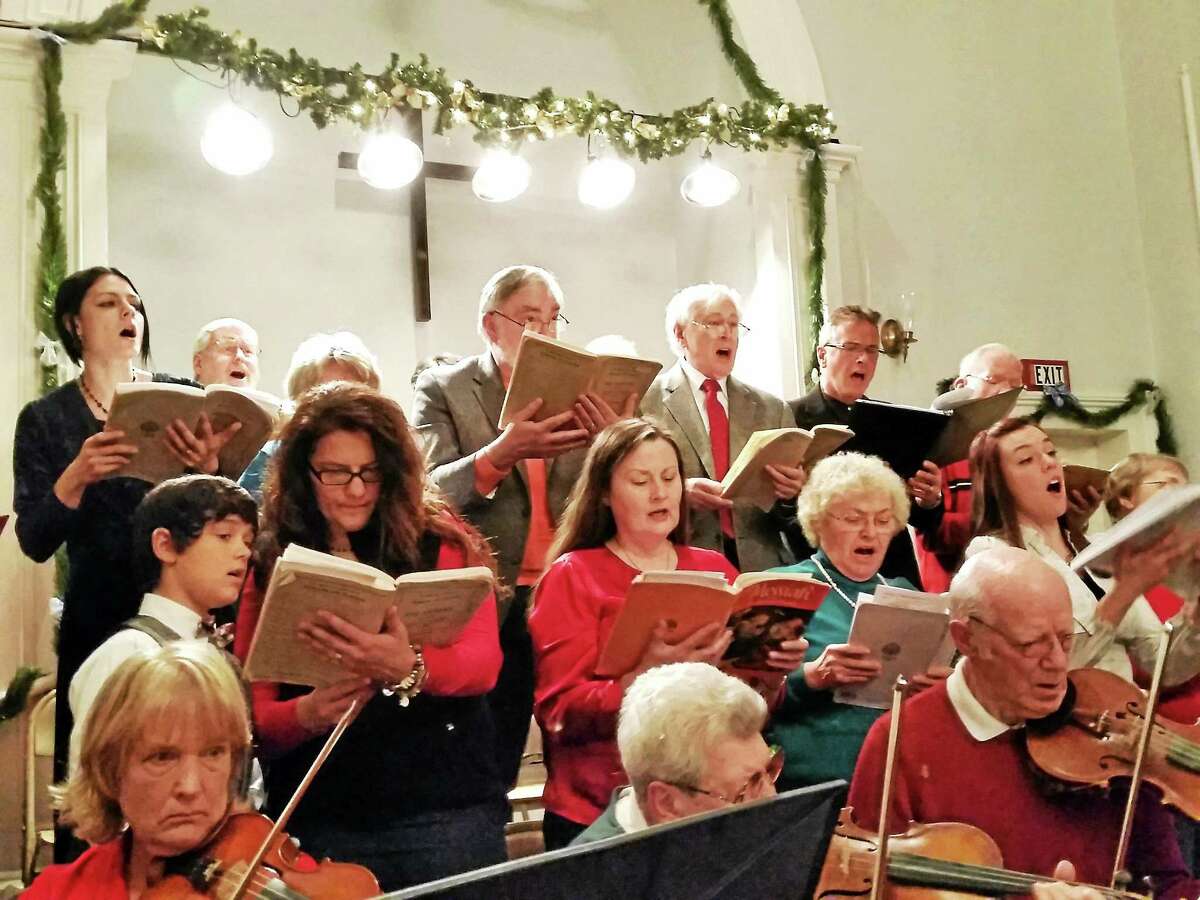 Singers and orchestra members of the First Congregational Church of Torrington perform the Christmas portion of Handel’s “Messiah” in Torrington on Sunday evening.
