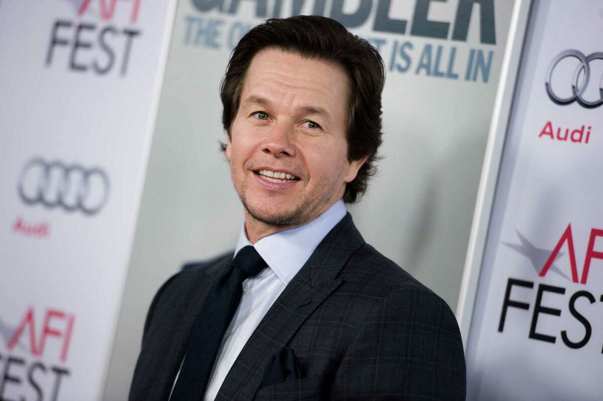 In this Nov. 10, 2014 photo, Mark Wahlberg arrives at the 2014 AFI Fest - “The Gambler,” in Los Angeles. Wahlberg is asking Massachusetts for a pardon for an assault he committed in 1988 when he was a troubled teenager in Boston.
