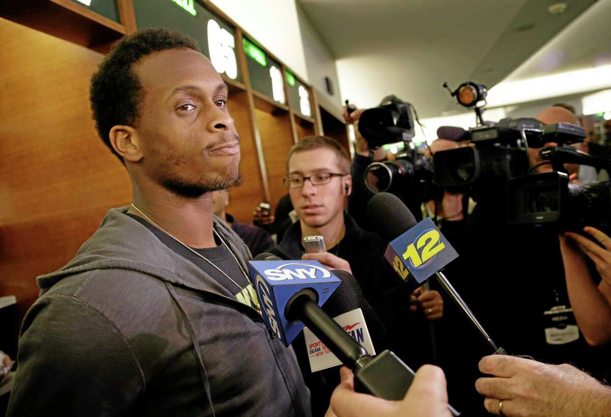 New York Jets’ quarterback Geno Smith speaks to reporters in the locker room of the Jets training facility in Florham Park, N.J., on Monday.