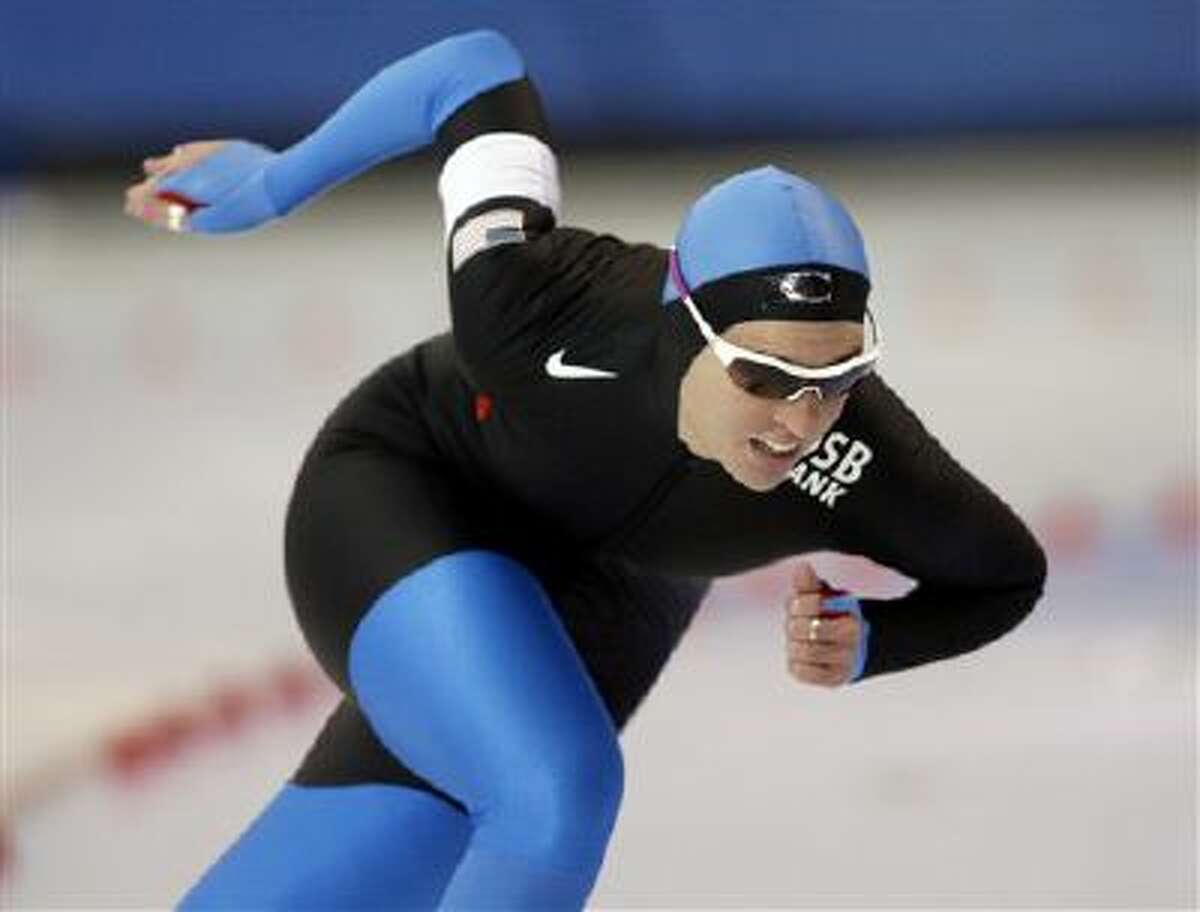 United States' Kelly Gunther skates to a second place finish in the women's 1,000-meter event at the US Olympic speedskating trials at the Utah Olympic Oval in Kearns, Utah, Wednesday, Dec. 30, 2009.