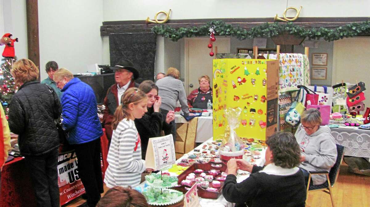 People fill the Colebrook Center on Saturday for the Colebrook Community Holiday Fair.