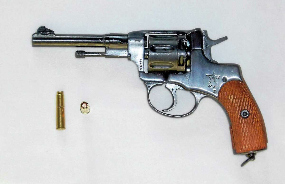 A game of Russian roulette is set up with a Nagant revolver in this Wikipedia photo illustration.