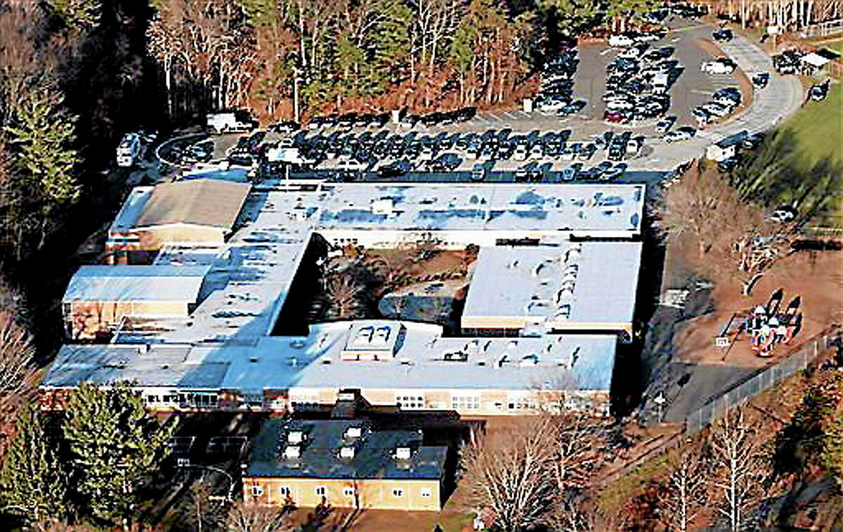 FILE - This Dec. 14, 2012 aerial file photo shows the Sandy Hook Elementary School in Newtown on the day of the shootings.