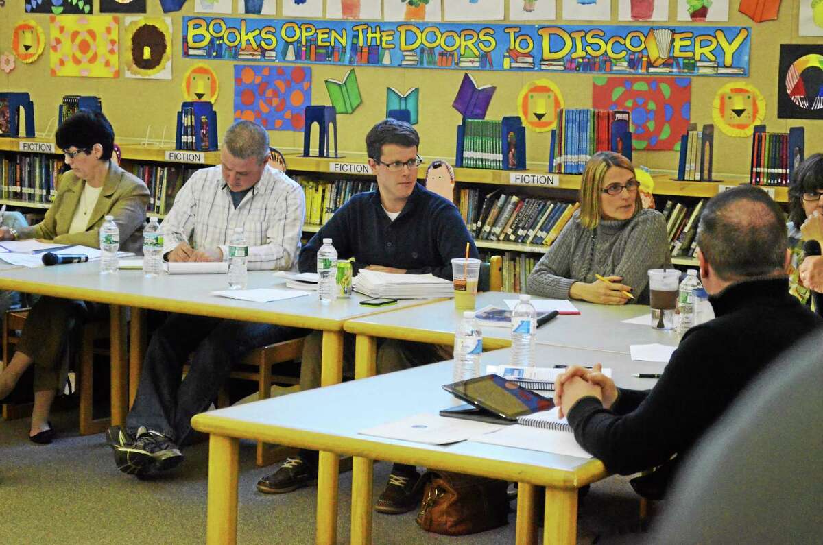 Torrington Superintendent Cheryl Kloczko, Board of Education Chair Kenneth Traub, board member Christopher Rovero, and board vice chair Fiona Cappabianca seen during a public hearing on Kloczko’s proposed budget for the district Monday evening.