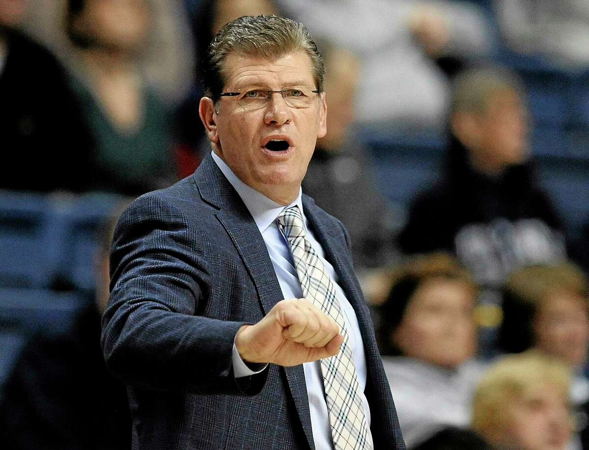 UConn head coach Geno Auriemma gestures toward his team during the first half of Sunday’s game against Cincinnati in Storrs.