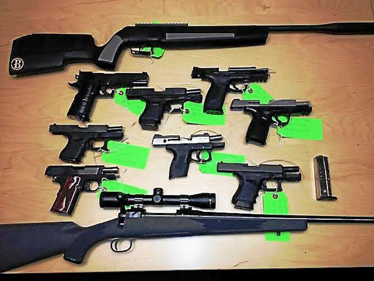 Some of the weapons allegedly stolen a gun store on Main Street in Old Saybrook. Police there say they recovered the guns from the home of 25-year-old Thomas Russo after an hour-long standoff.
