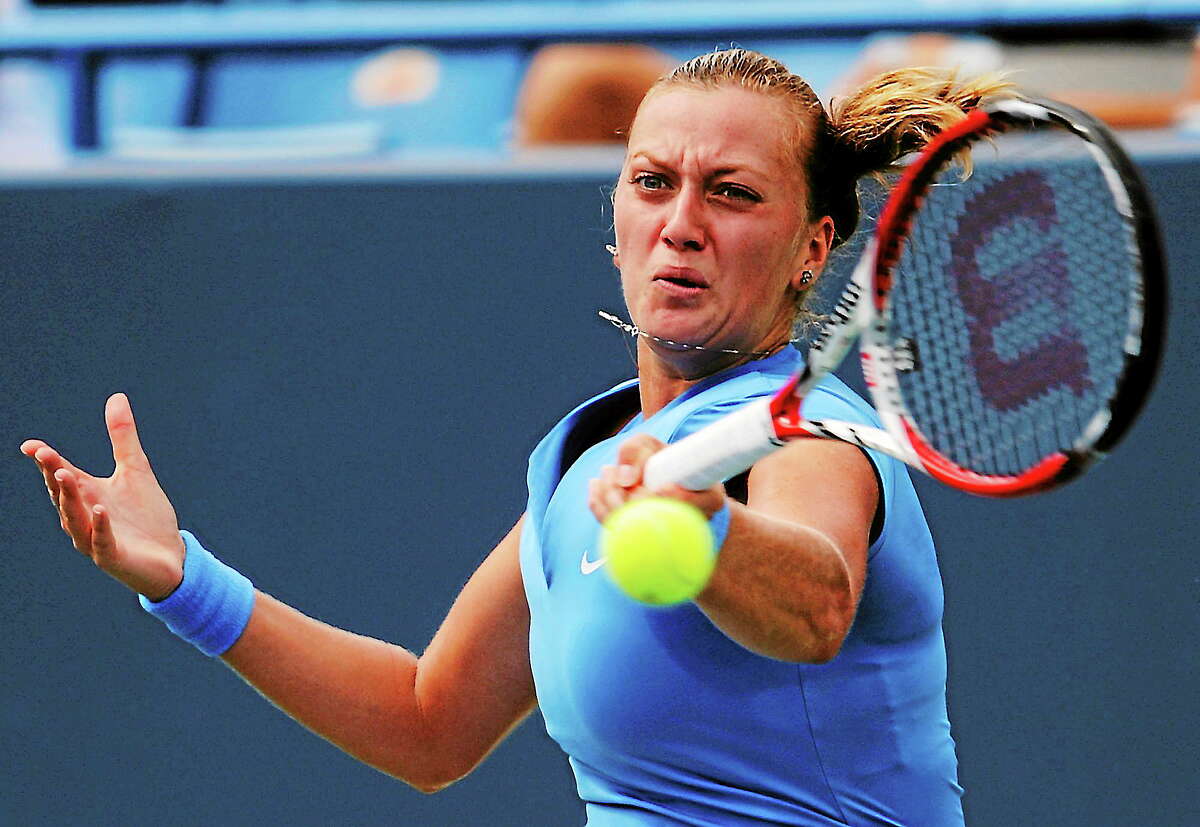 Petra Kvitova hits a return to Anastasia Pavlyuchenko during their match at the New Haven Open.
