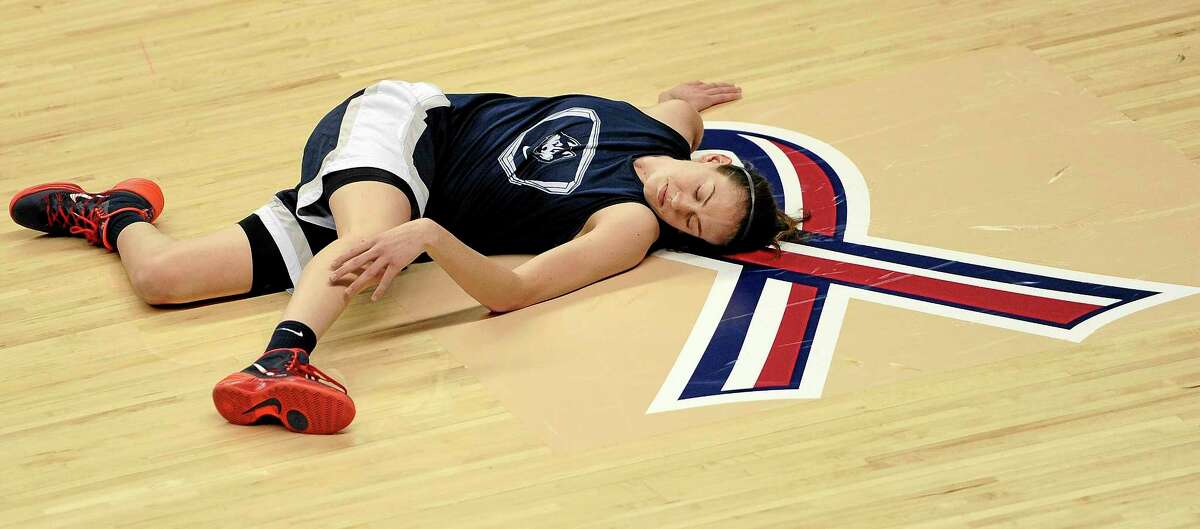 Breanna Stewart stretches during practice at Gampel Pavilion in Storrs on Saturday. UConn takes on Prarie View A&M in an NCAA tournament first-round game on Sunday.