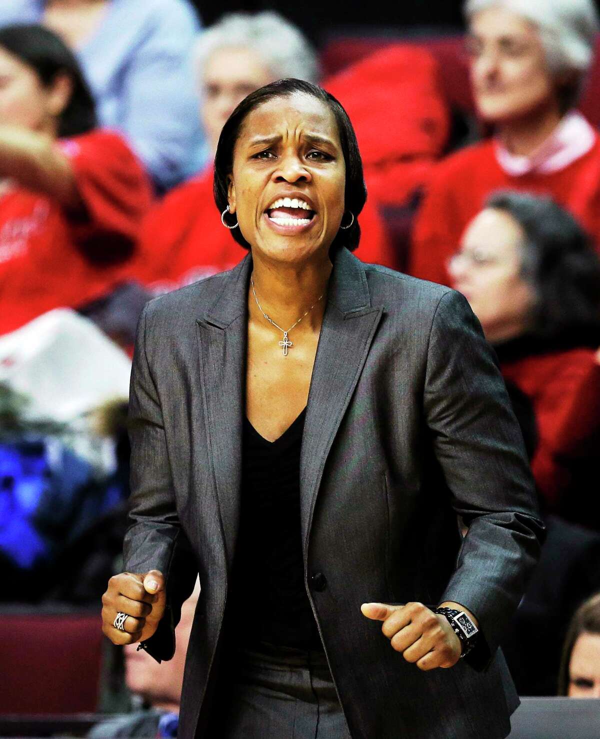 Former UConn player and assistant coach Jamelle Elliott will be back in Storrs Sunday as her Cincinnati Bearcats take on the top-ranked Huskies.