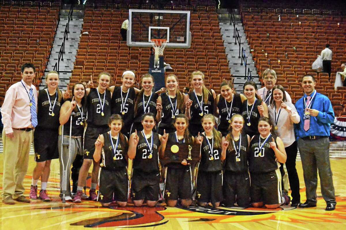 Pete Paguaga - Register Citizen The Thomaston Golden Bears pose with the Class S Championship plaque after defeating St. Paul 61-57 in double overtime. This is Thomaston first girls basketball State championship since 1993. Abby Hurlbert hit three-free throws with 0.2 seconds left in the first overtime to tie the game and send it to the second overtime. It was the second game in CIAC State Tournament history to go to two overtimes.