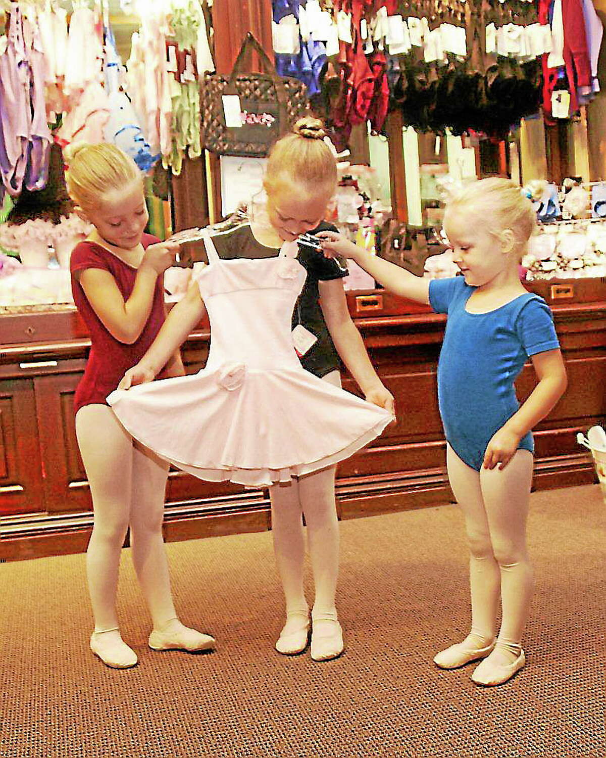 Submitted photo - Nutmeg Students from Pre-Ballet Grades 1 and 2 enjoy the one-stop Dance Shop while they register for the TSOB fall  program.