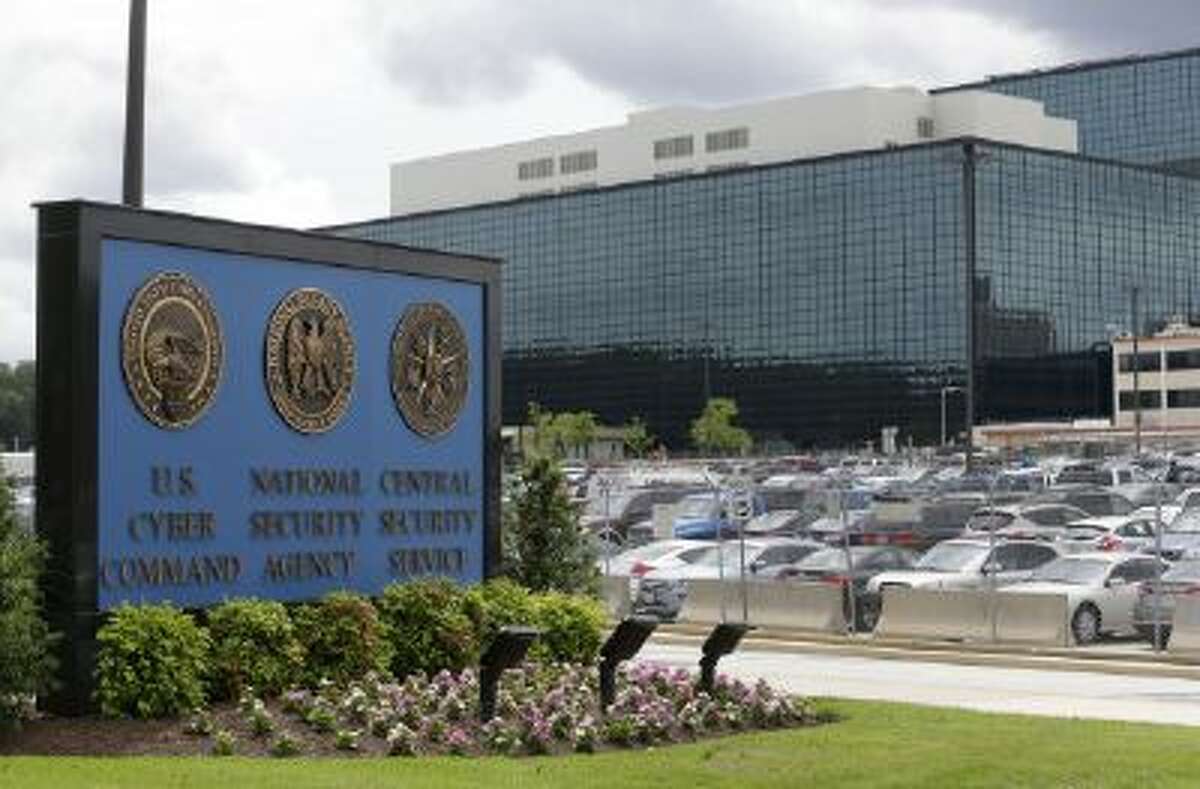 A file photo shows a sign outside the National Security Agency in For Meade, Md.