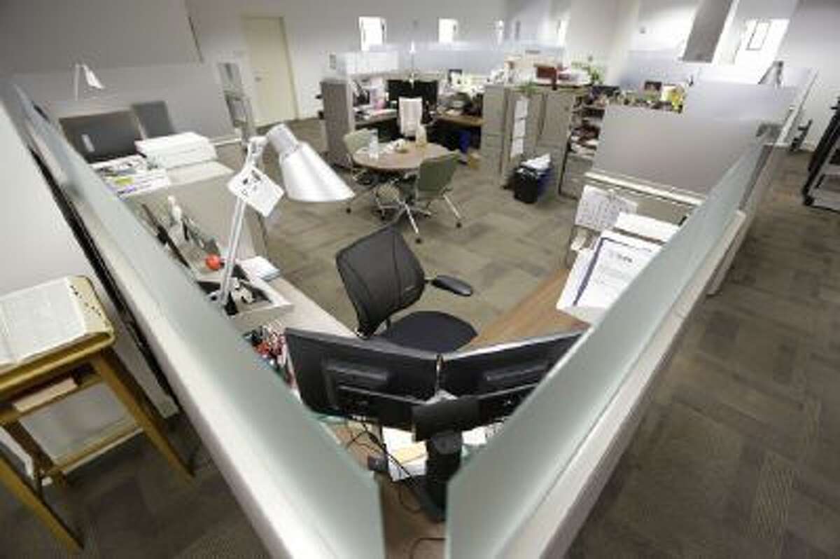 Chairs and cubicles are empty at the U.S. Army Garrison Ft. Lee Management Services budget office in Petersburg, Va., during the government shutdown in October.