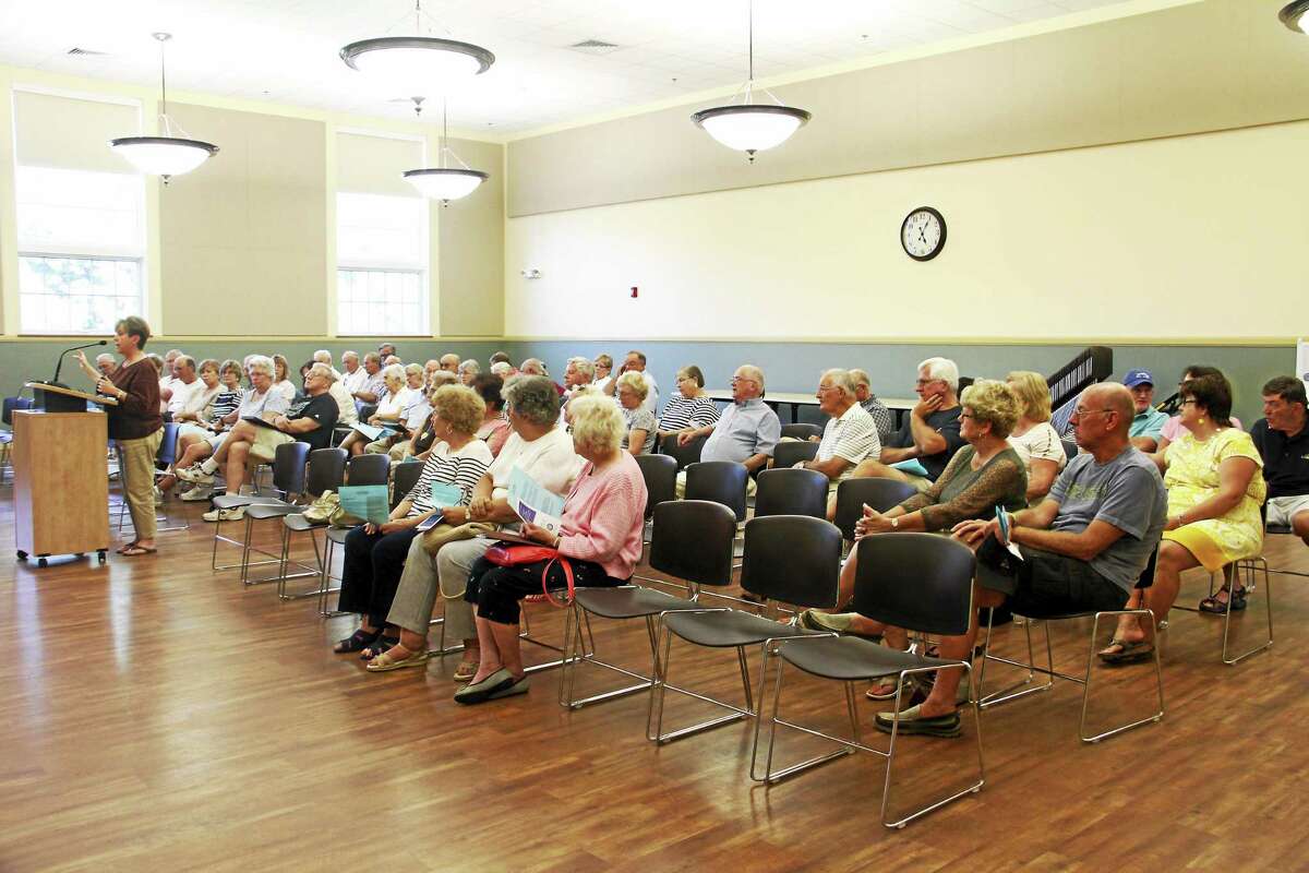 City residents attend a revaluation information meeting Monday at City Hall in Torrington.