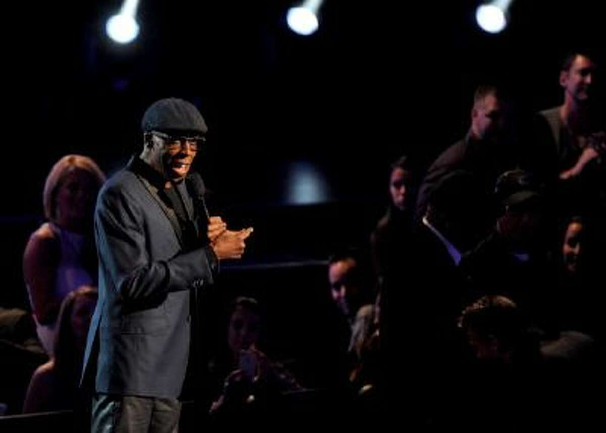 Arsenio Hall announces nominees for Best New Artist onstage at the Nominations Concert for the 56th Annual Grammy Awards, on Friday, Dec. 6, 2013 at Nokia Theatre L.A. Live in Los Angeles, Calif.