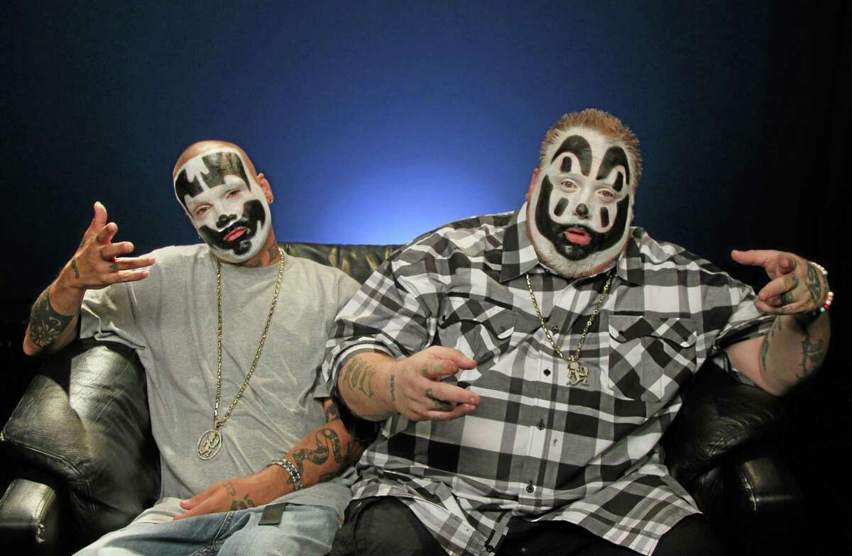 This July 29, 2013 photo shows Joseph Utsler, also known as Shaggy 2 Dope, left, and Joseph Bruce, also known as Violent J, from Insane Clown Posse, in New York. On their FUSE TV weekly show, the Detroit-area rappers critique all things pop culture, claiming to bring an outsiders perspective. A good part of the show has the guys critiquing music videos, much like Beavis and Butthead from a generation ago. (AP Photo/John Carucci)