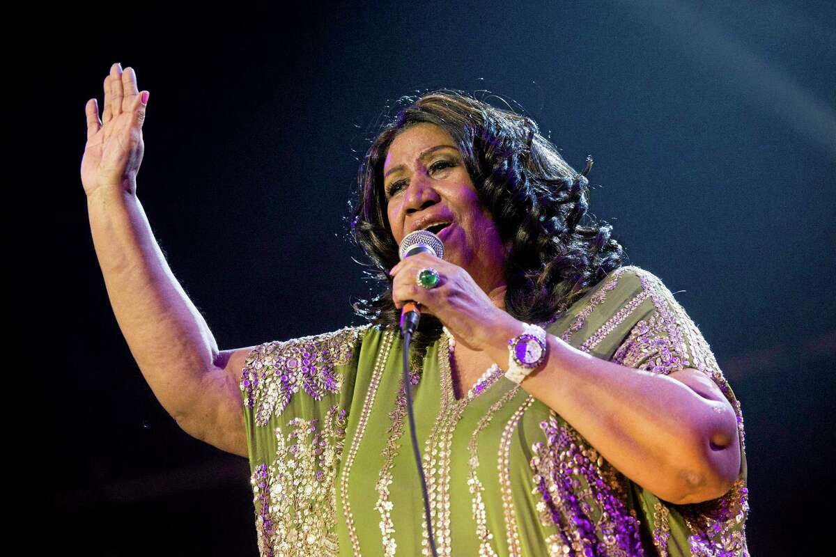 FILE - In this May 11, 2013 file photo, Aretha Franklin performs during McDonald's Gospelfest 2013 at the Prudential Center in Newark, N.J.Franklin won’t say what has caused her latest health problems, but says she’s had a “miraculous” recovery and is looking forward to performing soon.In a phone interview on Tuesday, Aug. 20, Franklin said that she recently had a cat scan and that it showed she was 85 percent improved. The 71-year-old has canceled several concerts and public appearances and blamed it on unspecified treatment. (Photo by Charles Sykes/Invision/AP, File)