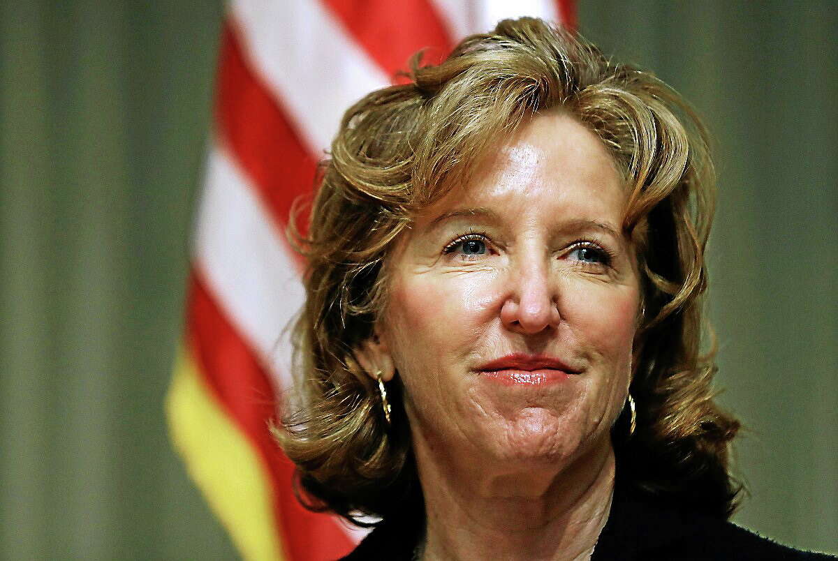 In this April 16, 2014 photo, Sen. Kay Hagan, D-N.C., listens during an appearance in Durham, N.C. Hagan in North Carolina and Jeanne Shaheen in New Hampshire face heavy outside spending but have Emily’s List backing.