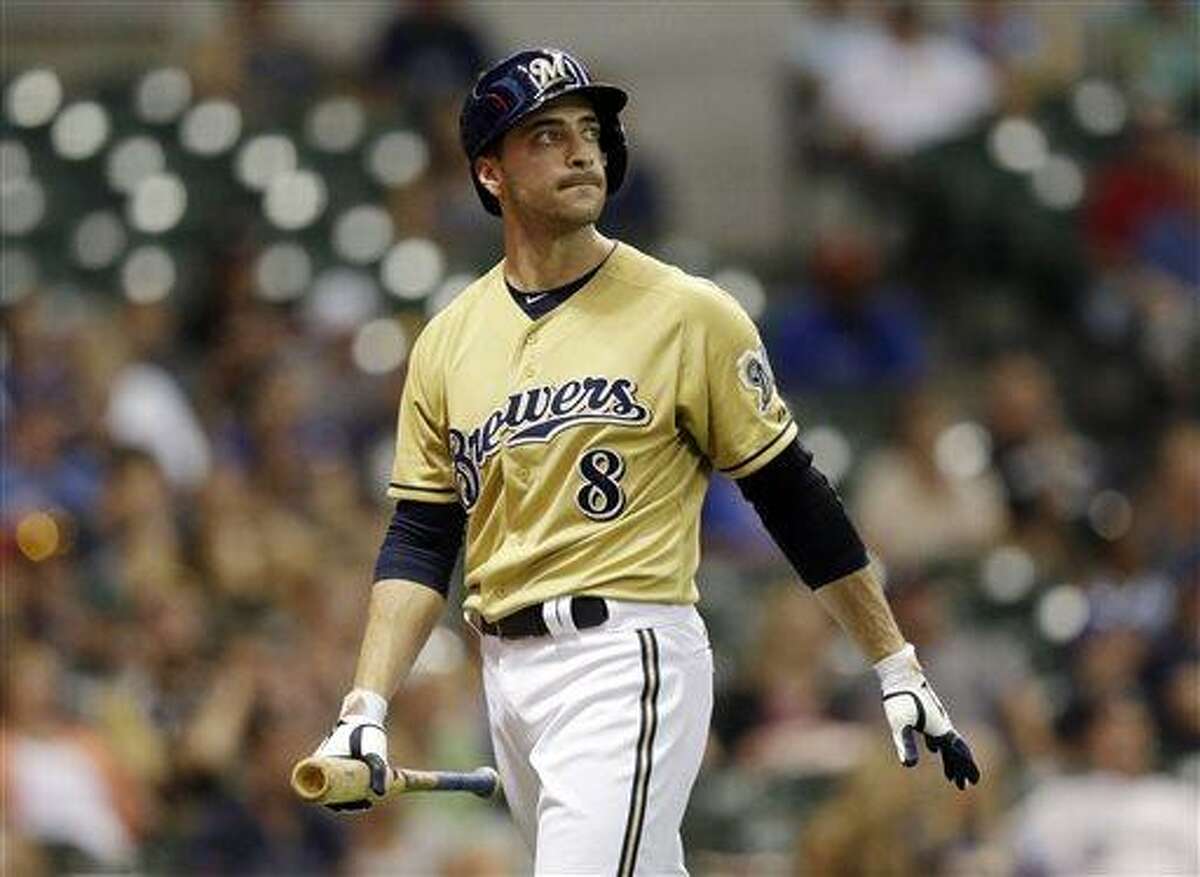 FILE - In this July 21, 2013 file photo, Milwaukee Brewers' Ryan Braun reacts after striking out after pinch hitting during the 11th inning of a baseball game against the Miami Marlins in Milwaukee. A former college classmate sued Braun, saying the Brewers slugger sought his help in fighting a failed drug test, balked on paying him and then disparaged him when asked why their friendship soured. (AP Photo/Morry Gash, File)