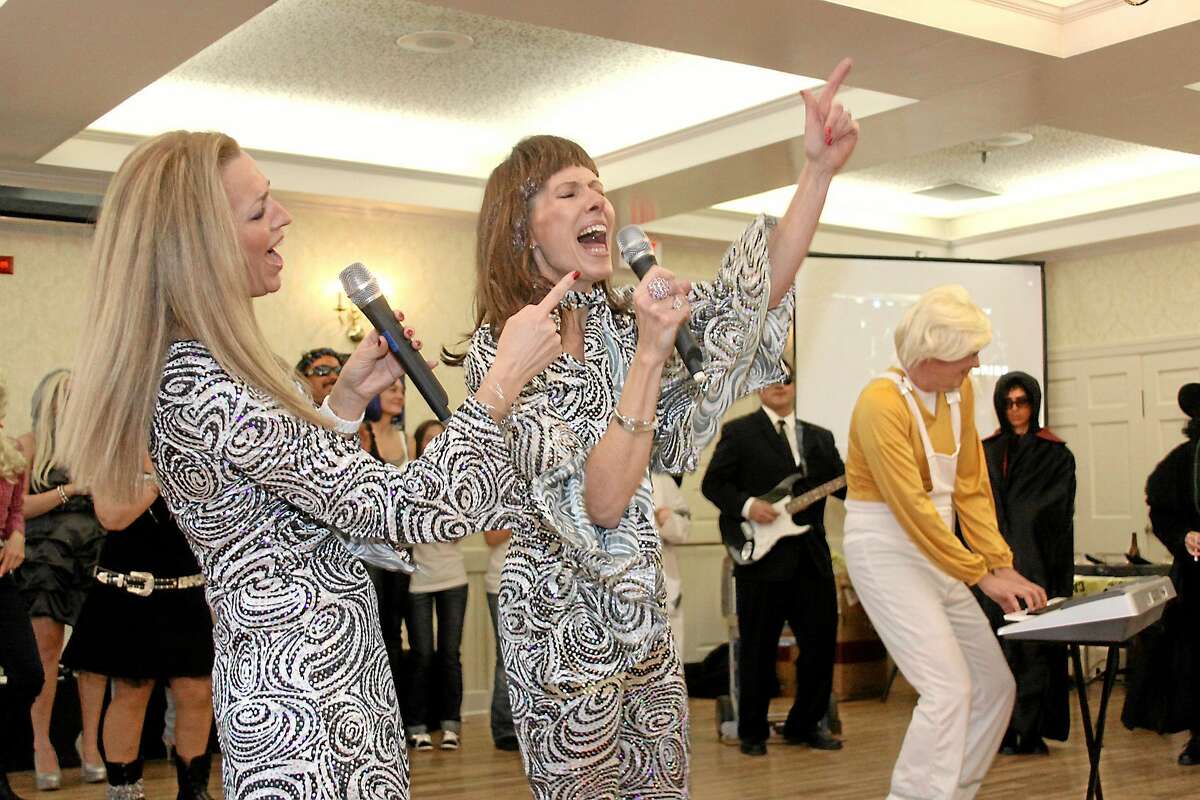 Abba performers sing during the Possum Queen Contest in Litchfield in January 2013.