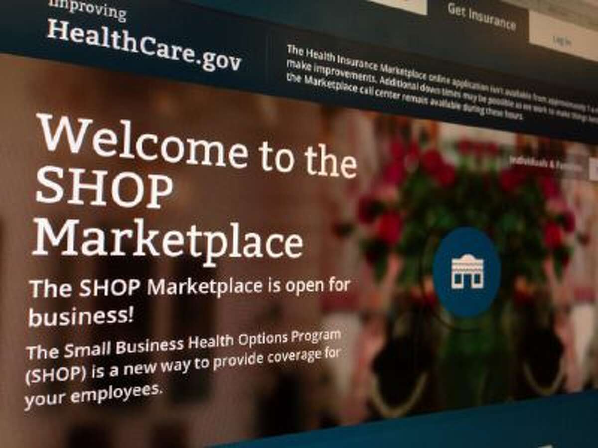 This Nov. 27, 2013 file photo of part of the HealthCare.gov website page featuring information about the SHOP Marketplace is photographed in Washington. Although multiple problems have snarled the rollout of President Barack Obama's signature health care law, it's hardly the first time a new, sprawling government program has been beset by early technical glitches, political hostility and gloom-and-doom denouncements.