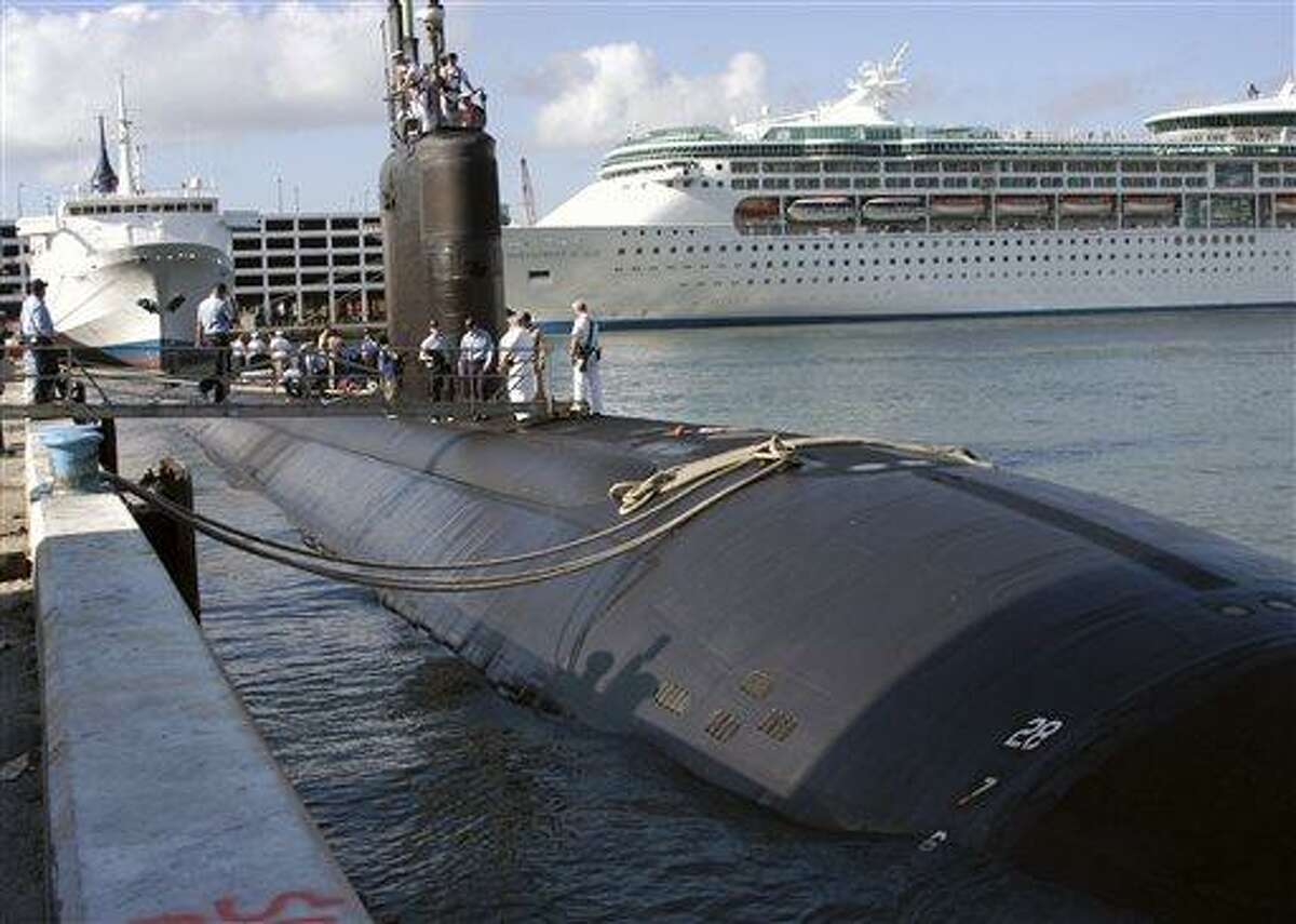 In this April 26, 2004 file photo provided by the U.S. Navy, the USS Miami (SSN 755) homeported in Groton, Conn., arrives in port in Fort Lauderdale, Fla. (AP Photo/U.S. Navy, Petty Officer 2nd Class Kevin Langford, File)