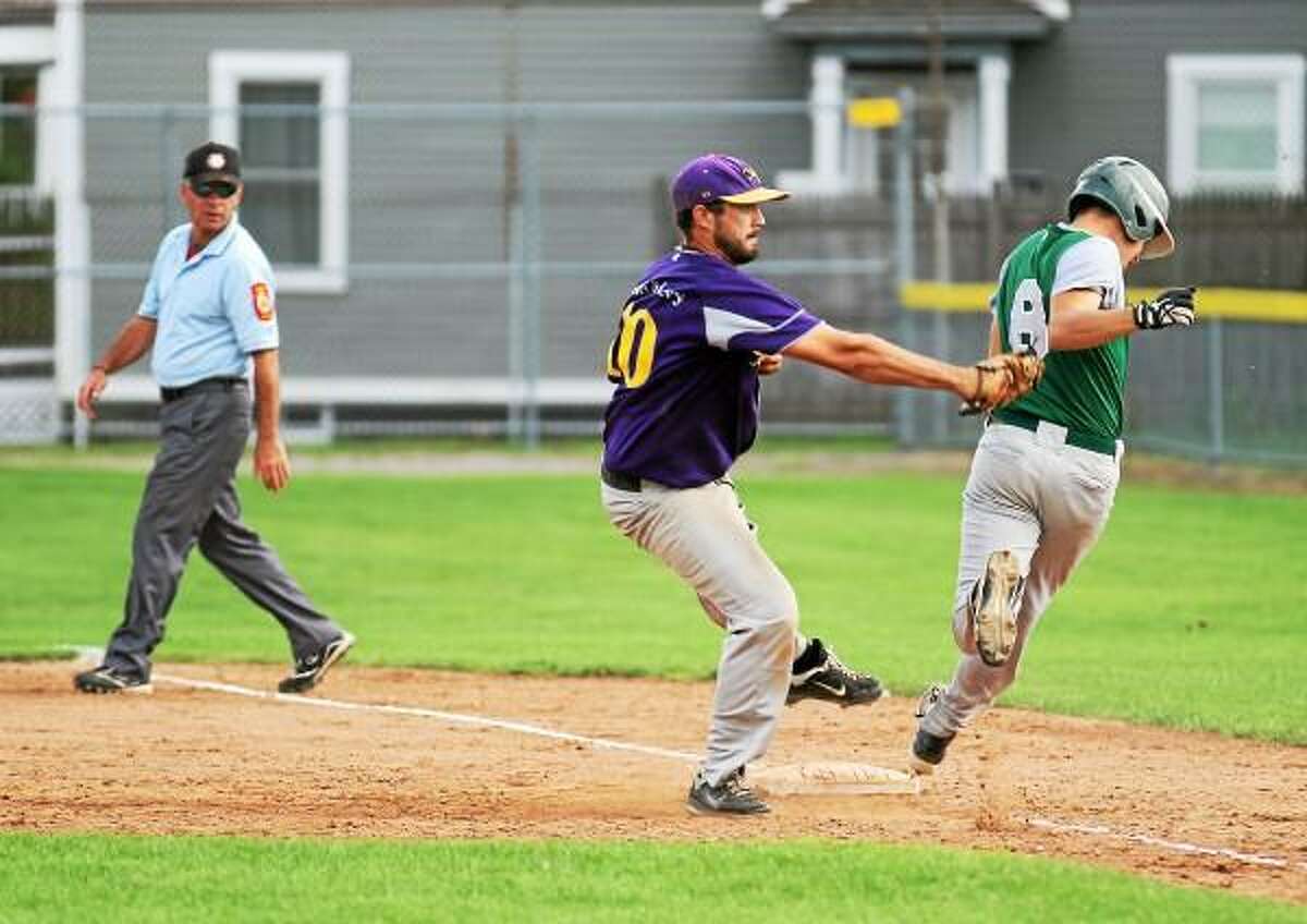 Marianne Killackey--Special to the Register Citizen Tri-Town's first baseman Joe Bunnel tags Bristol's Jimmy Hahn for the out.