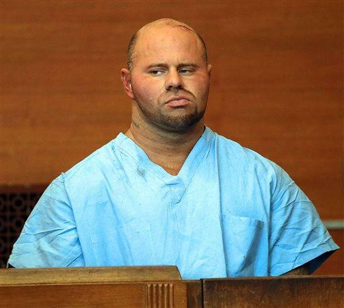 Jared Remy appears at Waltham District Court for his arraignment, Friday, Aug. 16, 2013, in Waltham, Mass., on domestic assault and battery charges in connection with the death of 27-year-old Jennifer Martel. Remy, the son of longtime Boston Red Sox broadcaster Jerry Remy, is being held without bail after pleading not guilty to a charge of murder stemming from allegations that he fatally stabbed his girlfriend at his home. (AP Photo/The Boston Herald, Mark Garfinkel)