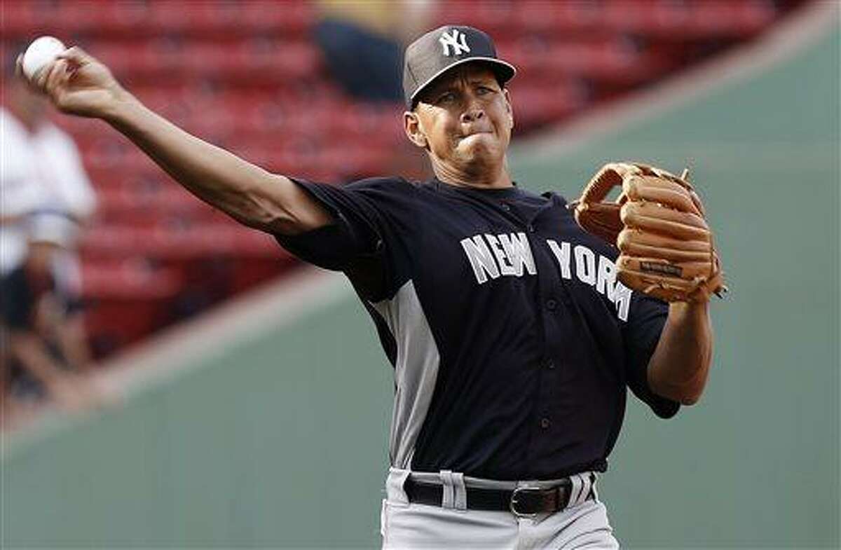 New York Yankees third baseman Alex Rodriguez throws before a baseball game against the Boston Red Sox at Fenway Park in Boston, Friday, Aug. 16, 2013. (AP Photo/Winslow Townson)