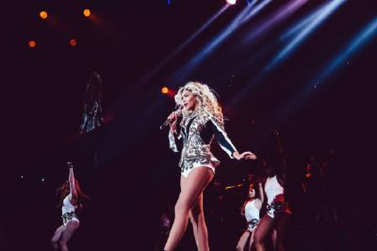 Beyonce performs onstage on her Mrs. Carter World Tour, on Friday, December 20, 2013 at the TD Garden in Boston, Mass.