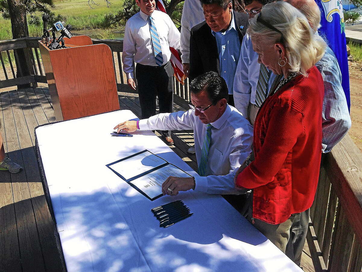 Gov. Dannel Malloy picked East Haven’s Farm River State Park as the backdrop for a ceremonial signing of anti-fracking waste legislation. The bill equates to a 3-year ban on the storage or handling of fracking waste in Connecticut.