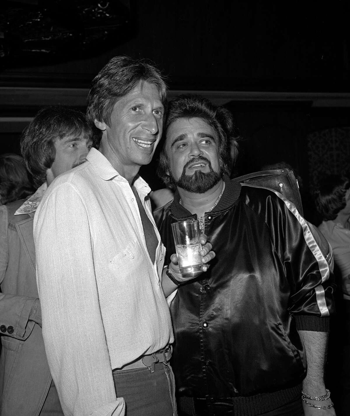 This 1979 photo released by the Las Vegas News Bureau shows David Brenner and Wolfman Jack at the Riviera. A spokesman for the family of the comedian says the "Tonight Show" favorite has died. He was 78. Brenner died Saturday March 15, 2014, at his home in New York City, said Jeff Abraham, who was Brenner's publicist. (AP Photo/ Las Vegas News Bureau)