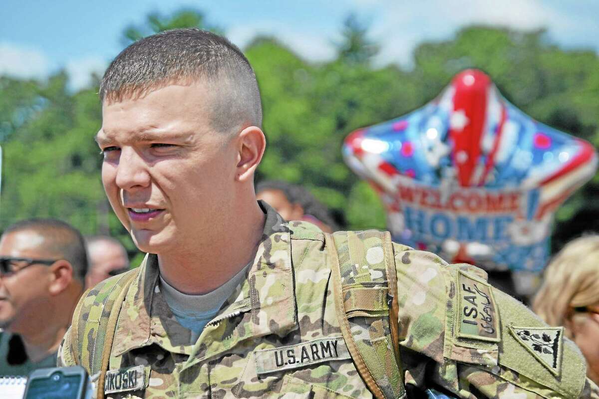 Sgt. Jonathan Miscikoski was one of five Torrington men to return home from Afghanistan Thursday as the 1048th Transportation Company of the Connecticut National Guard landed in East Granby.