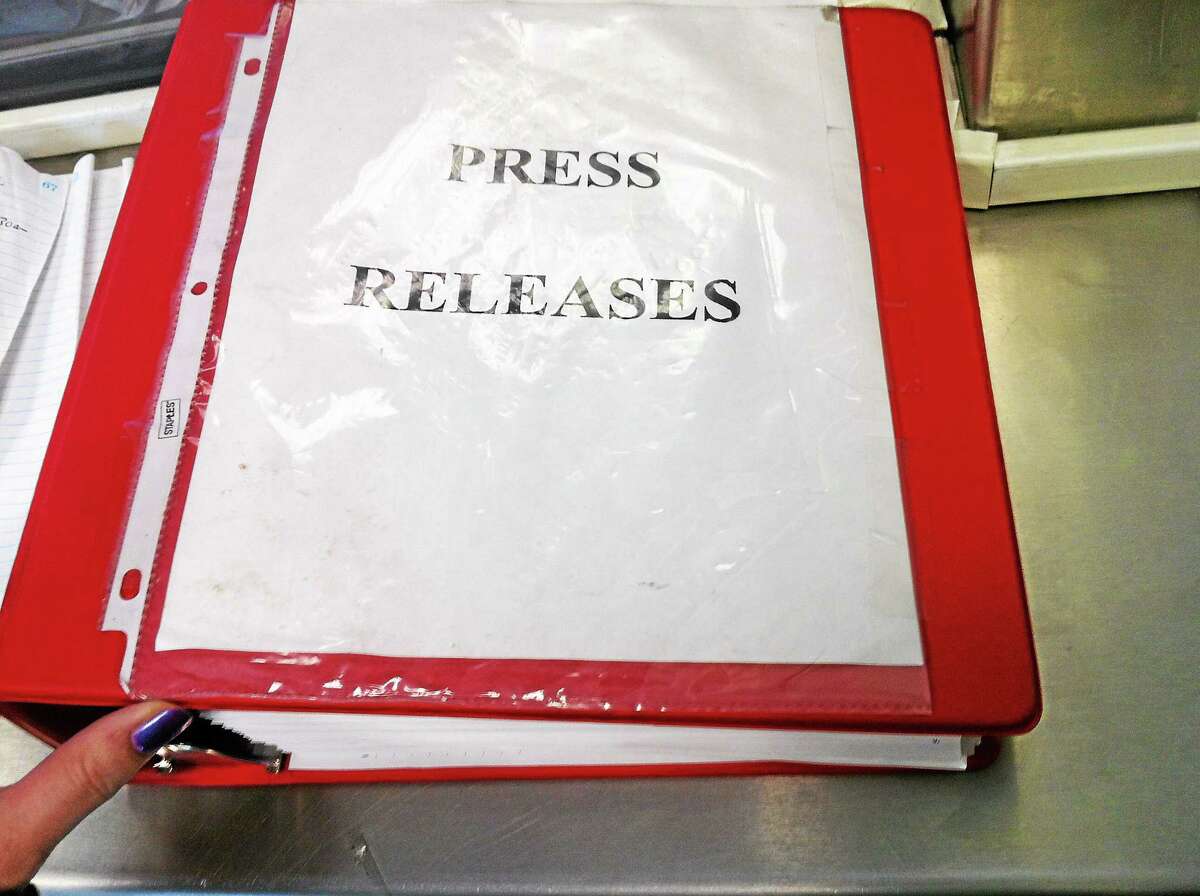 A book of press releases about arrests available in the lobby of the Seymour Police Department for the public.