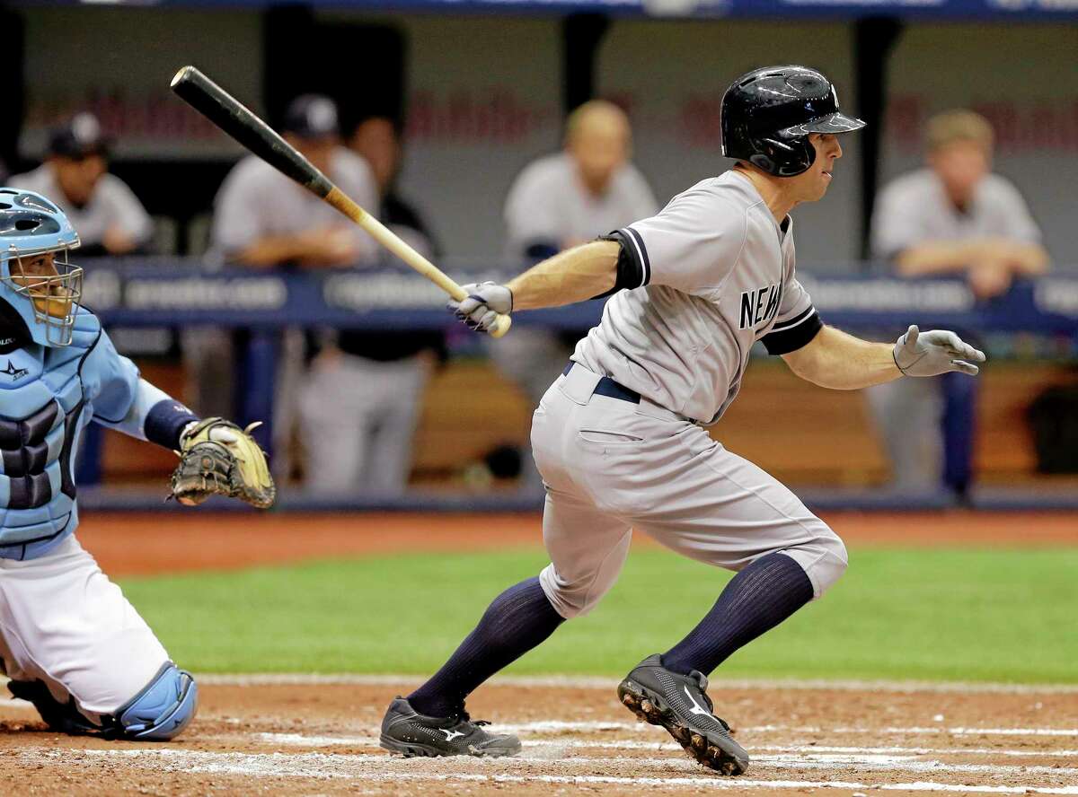 The Yankees’ Brett Gardner lines a two-run single in the fifth inning Sunday.