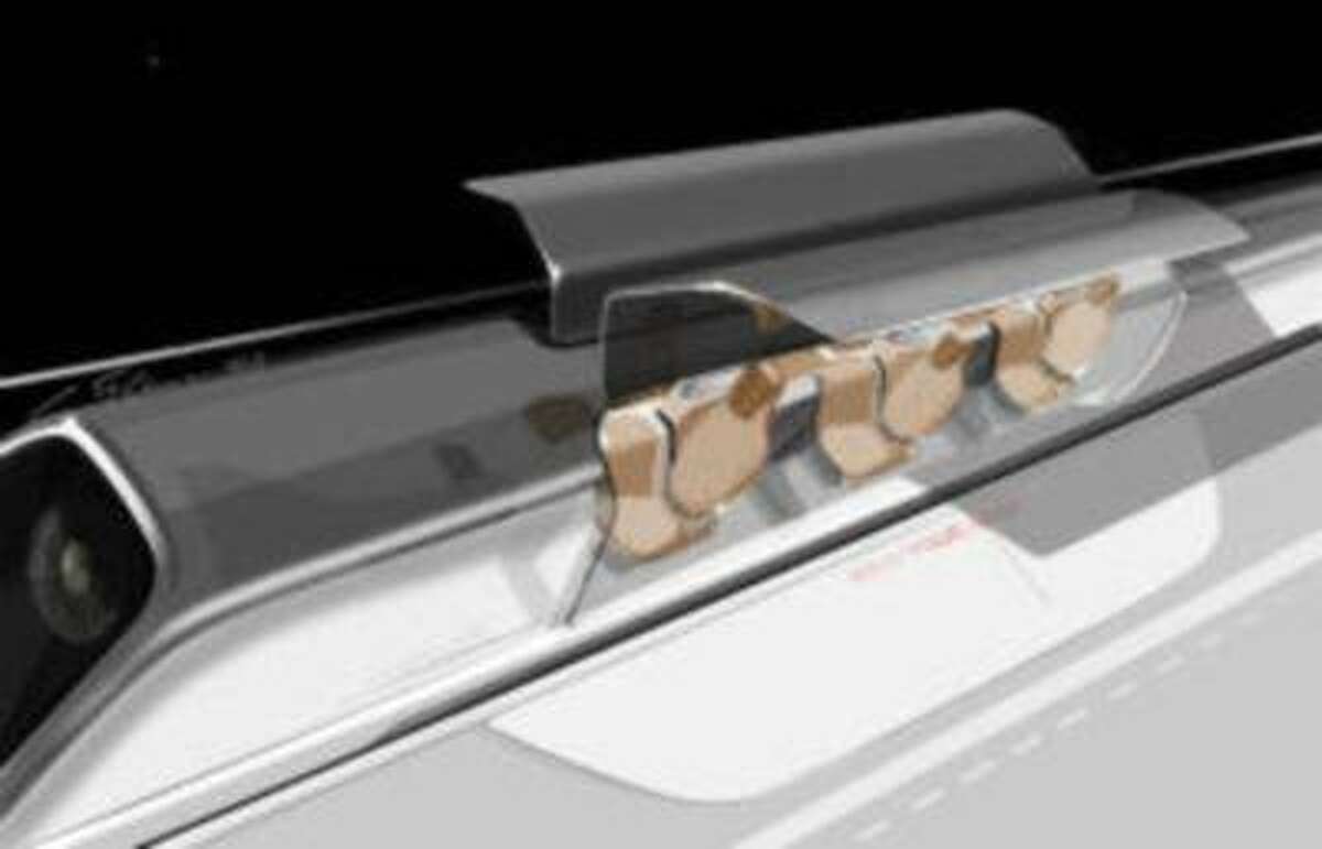 A conceptual rendering of a Hyperloop passenger capsule version with doors open at a station.
