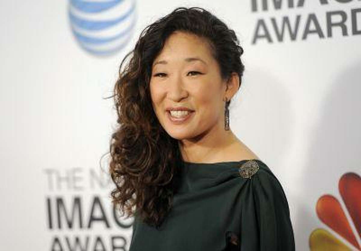 In this Feb. 1, 2013 photo, actress Sandra Oh arrives at the 44th Annual NAACP Image Awards at the Shrine Auditorium in Los Angeles. ABC says that "Grey's Anatomy" star Sandra Oh is leaving the medical drama after the coming season.