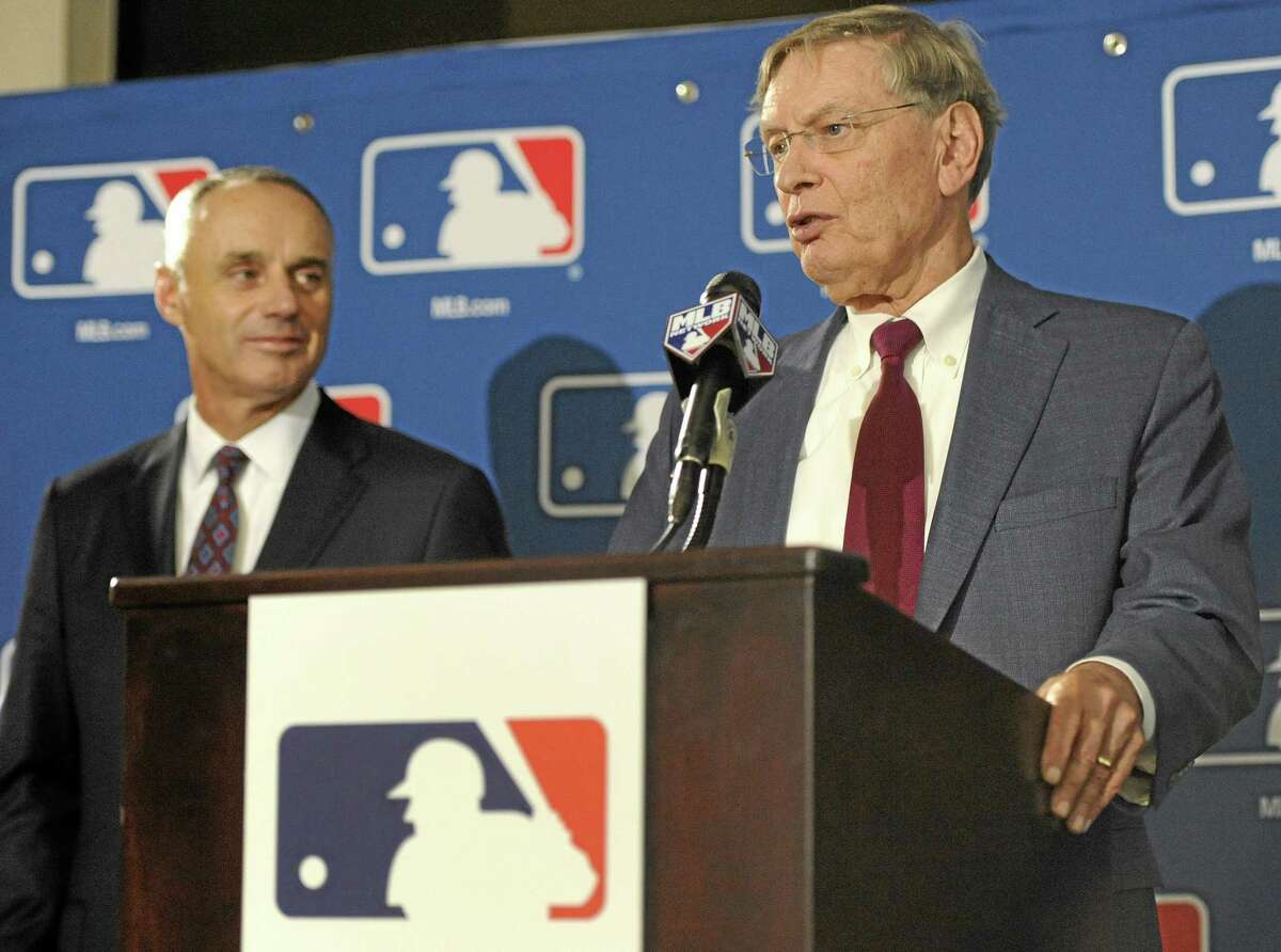 Major League Baseball Commissioner Bud Selig, right, and MMLB Chief Operating Officer Rob Manfred speak to reporters after team owners elected Manfred as the next commissioner during an owners quarterly meeting Thursday in Baltimore. Register sports columnist Chip Malafronte has a few suggestions for Manfred, including speeding up the game, reinstating Pete Rose and bringing back the bullpen car.