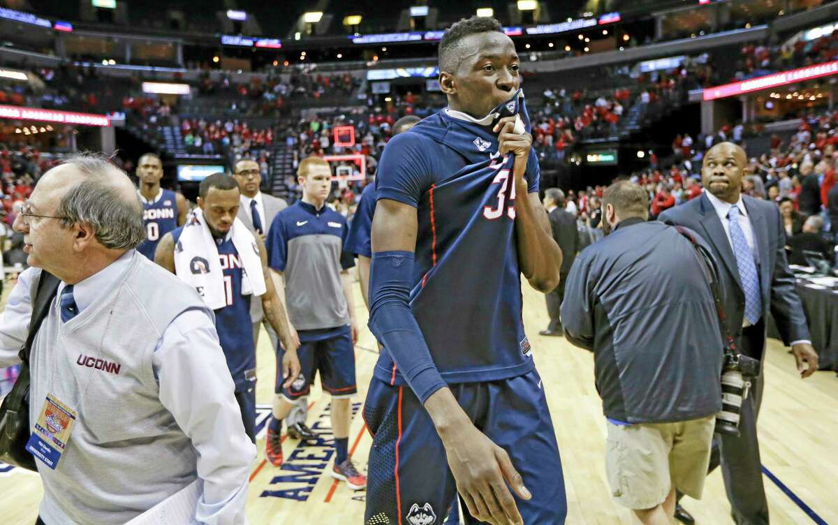 UConn center Amida Brimah (35) leaves the court following the Huskies’ 71-61 loss to Louisville in the American Athletic Conference tournament championship game on Saturday in Memphis, Tenn.